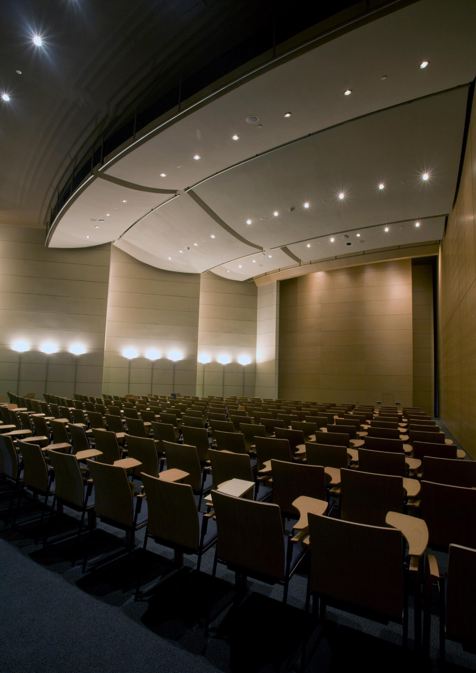 Executive Speaking and Industry Leadership Professional conference auditorium representing Mie Rajcic's expertise in executive speaking, safety-critical leadership, operational excellence, and organizational transformation